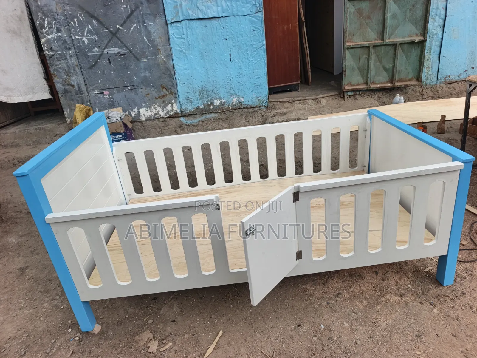 White and Blue Toddler Bed