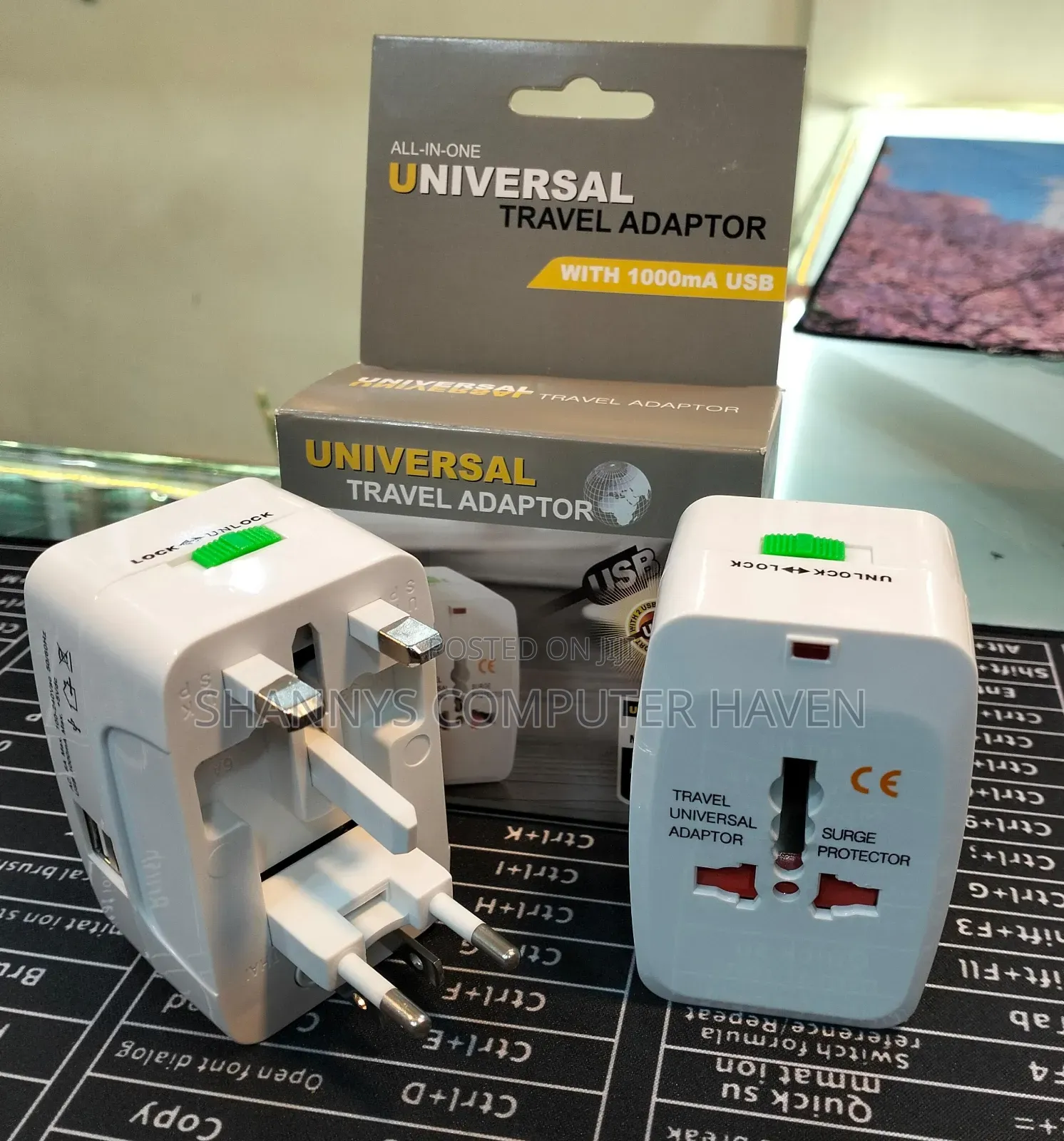 Universal Travel Adapter – USB Output 1000mA Max + 5VDC