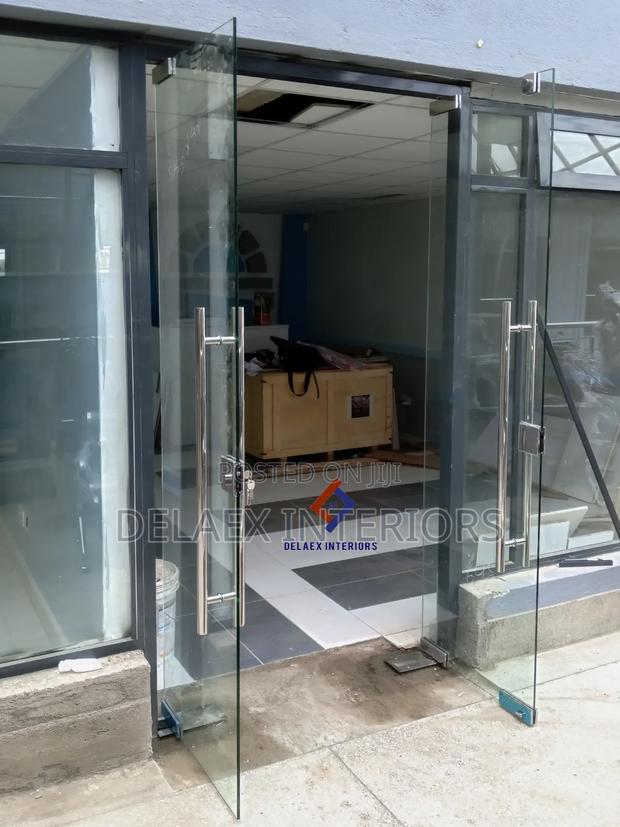 Double Frameless Glass Swing Door