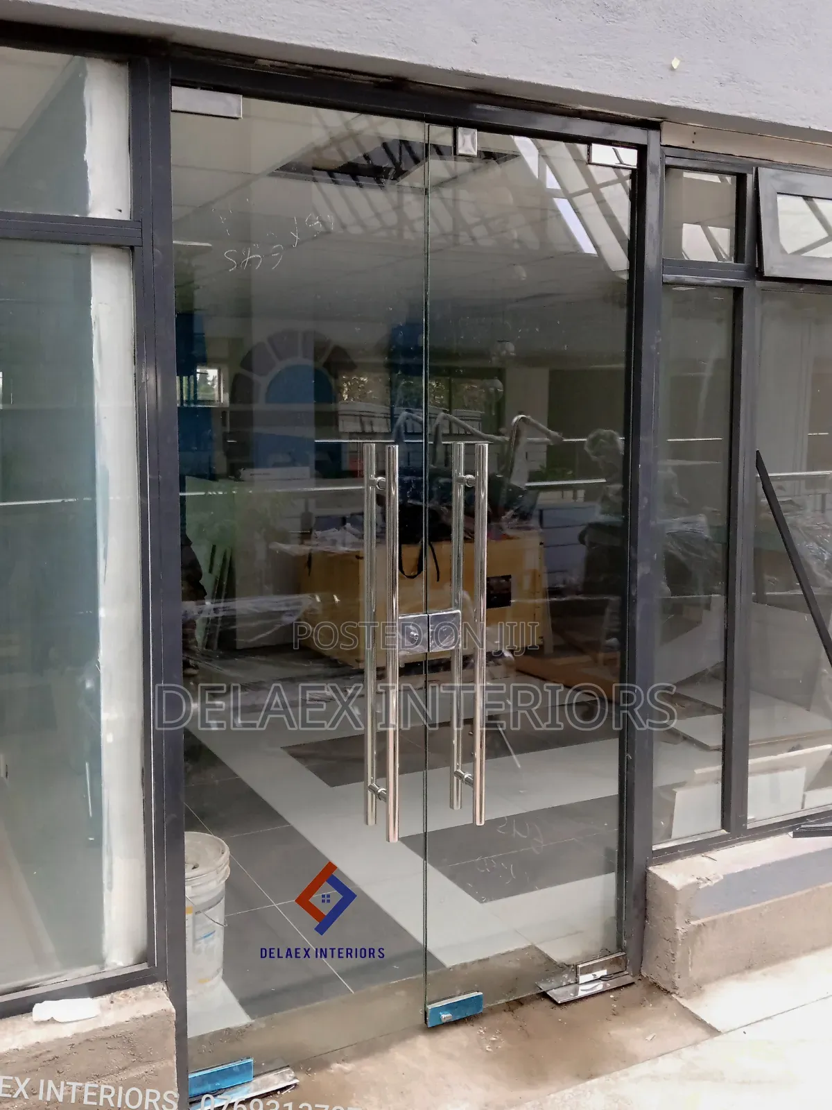 Double Frameless Glass Swing Door