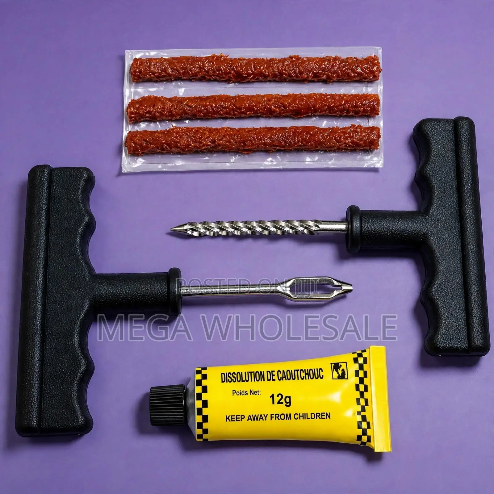 Tire Repair Kit With Brown Rubber Strips and Solution