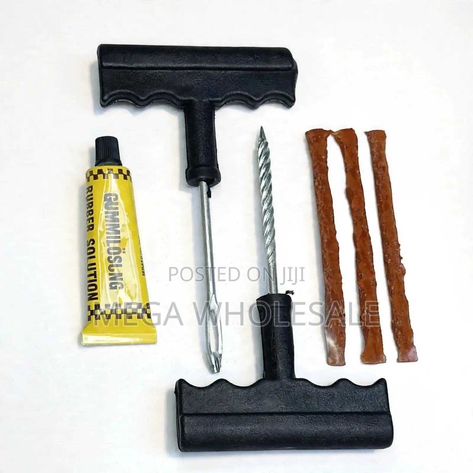 Puncture Repair Kit Featuring Rubber Cement Solution