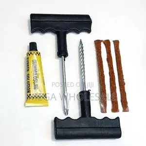 Puncture Repair Kit Featuring Rubber Cement Solution