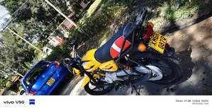 Bajaj Boxer 150 UG 2026 Yellow