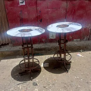 Unique Bar Tables,each With a Copper Metal Frame