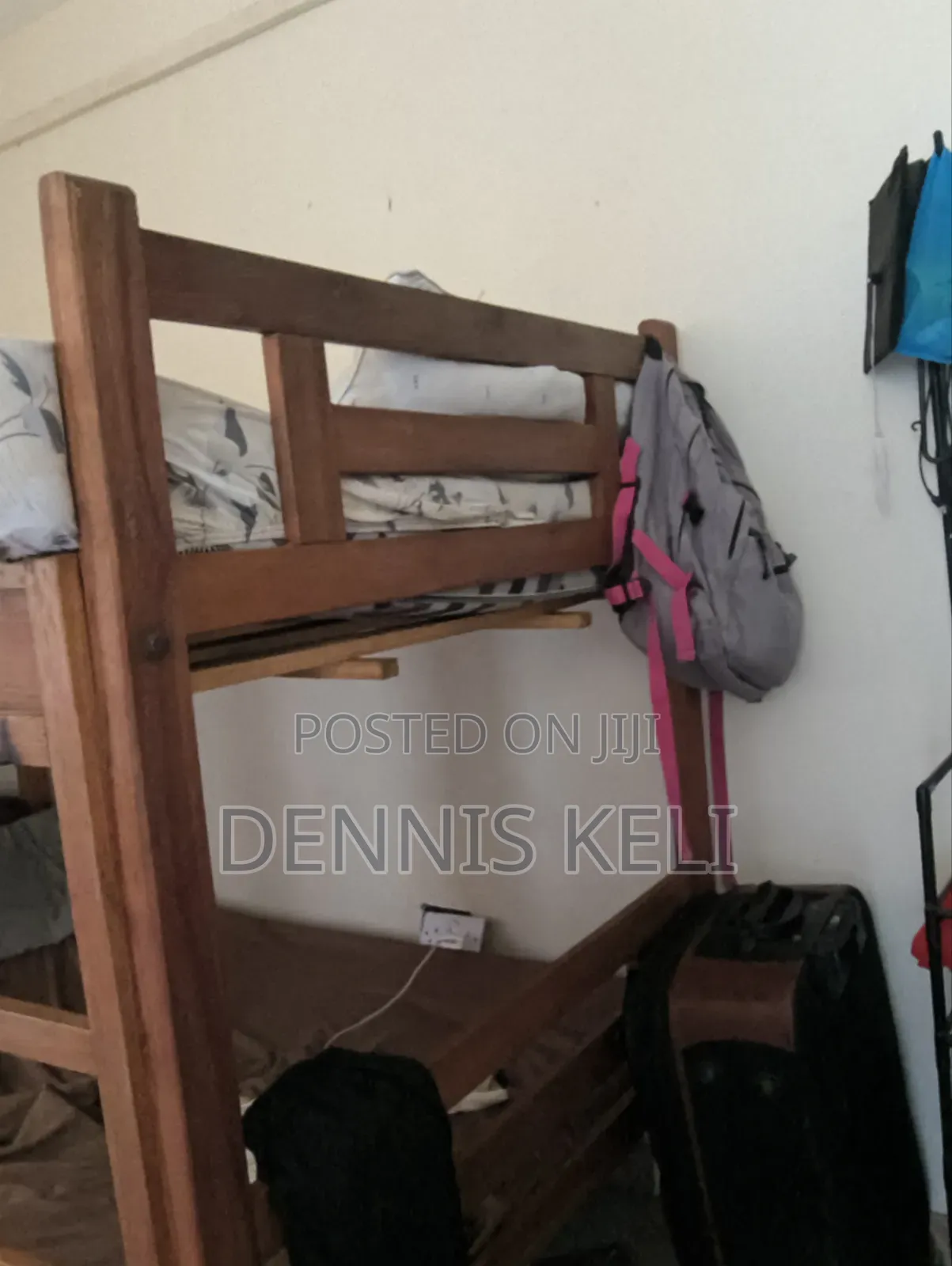 Doubledecker Bed Brown in colour.It's 3 and Half by 5 .Strong Material