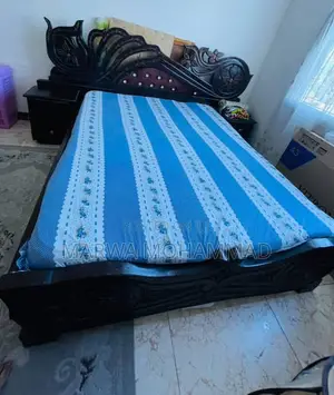 6 by 6 Mvule Bed
