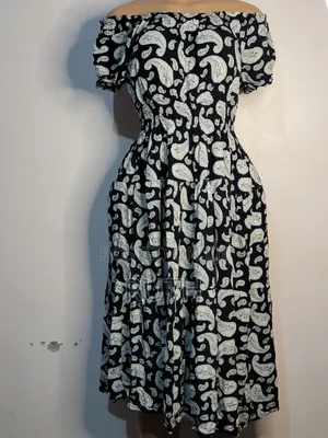Look Effortlessly Elegant and Feminine in This Gorgeous Sundress.