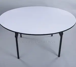 Round Foldable Table With Foldable Metallic Legs.