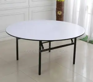 Round Foldable Table With Foldable Metallic Legs.