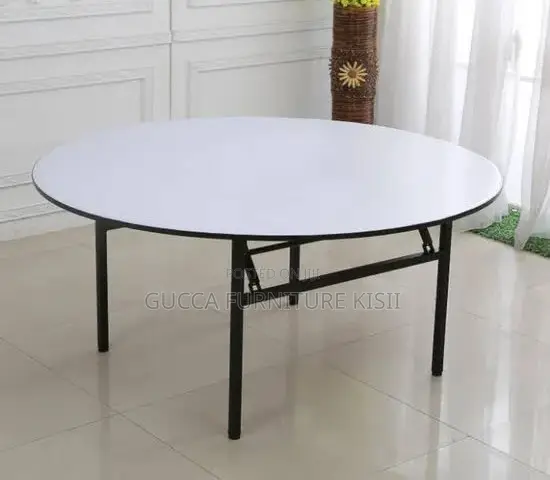 Round Foldable Table With Foldable Metallic Legs.