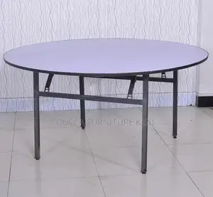Round Foldable Table With Foldable Metallic Legs.