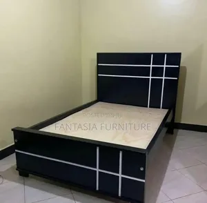 5 by 6 Black and White Wooden Bed
