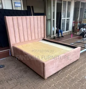 5 by 6 Pink Chesterfield Bed