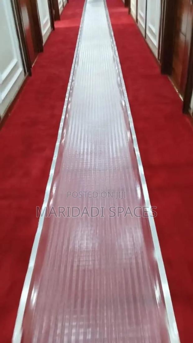 Say No to Stains- Clear Carpet Protector Available - main view