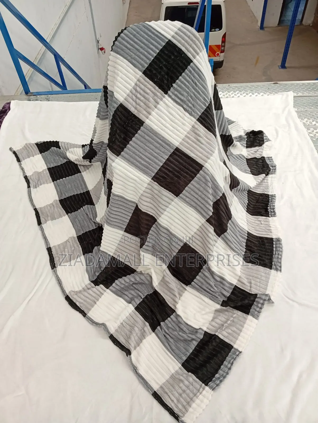 Sherman Checked Throw Blankets Now Available at Our Shop*