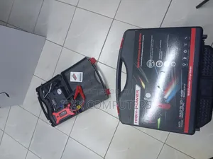 Compact Vehicle Jump Starter and Automatic Tire Inflator Kit