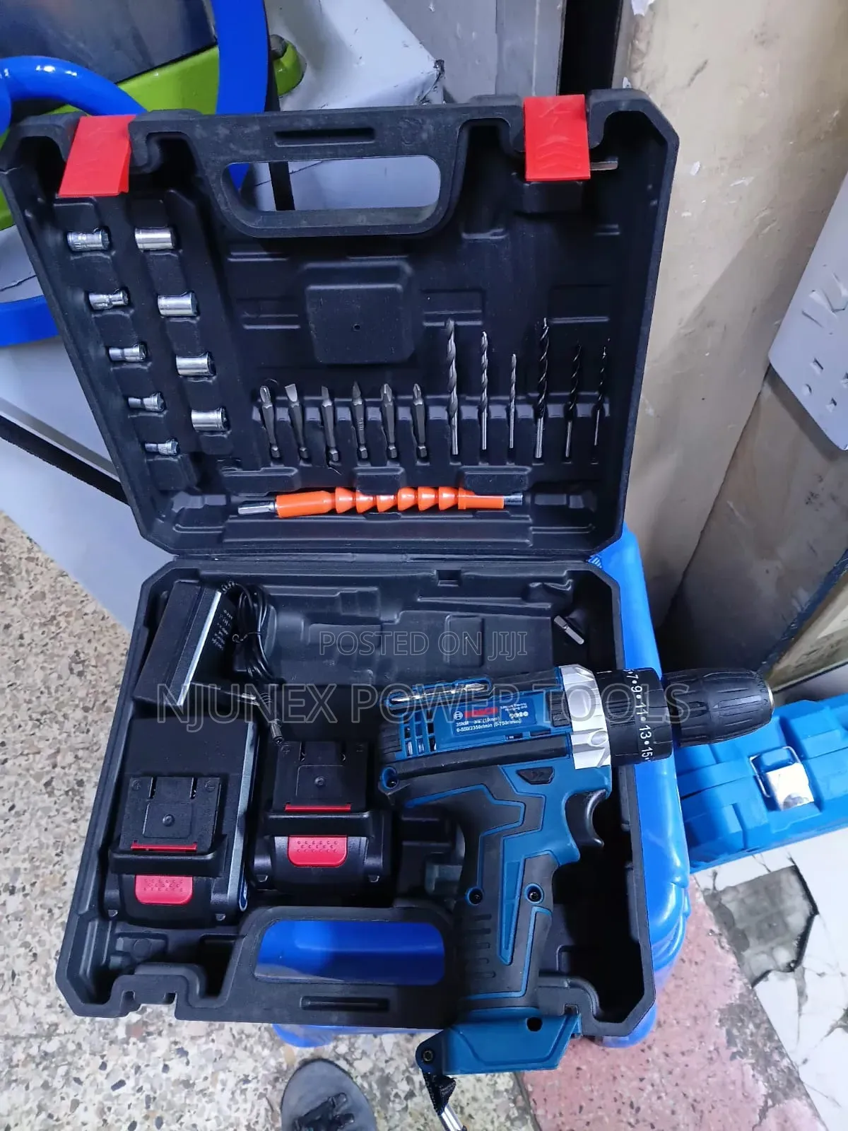 Blue and Black Makita Cordless Electric Drill Kit