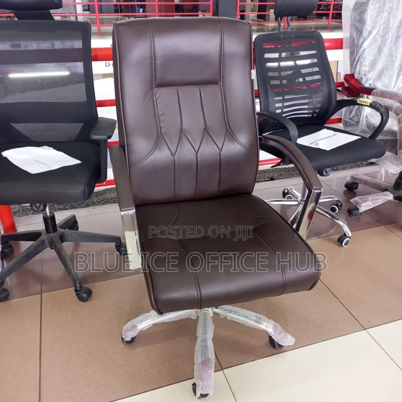 Executive High Back Office Chair – Brown Leather With Chrome Arms.