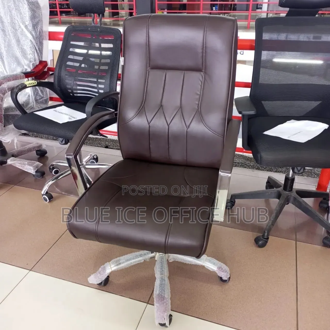Executive High Back Office Chair – Brown Leather With Chrome Arms.