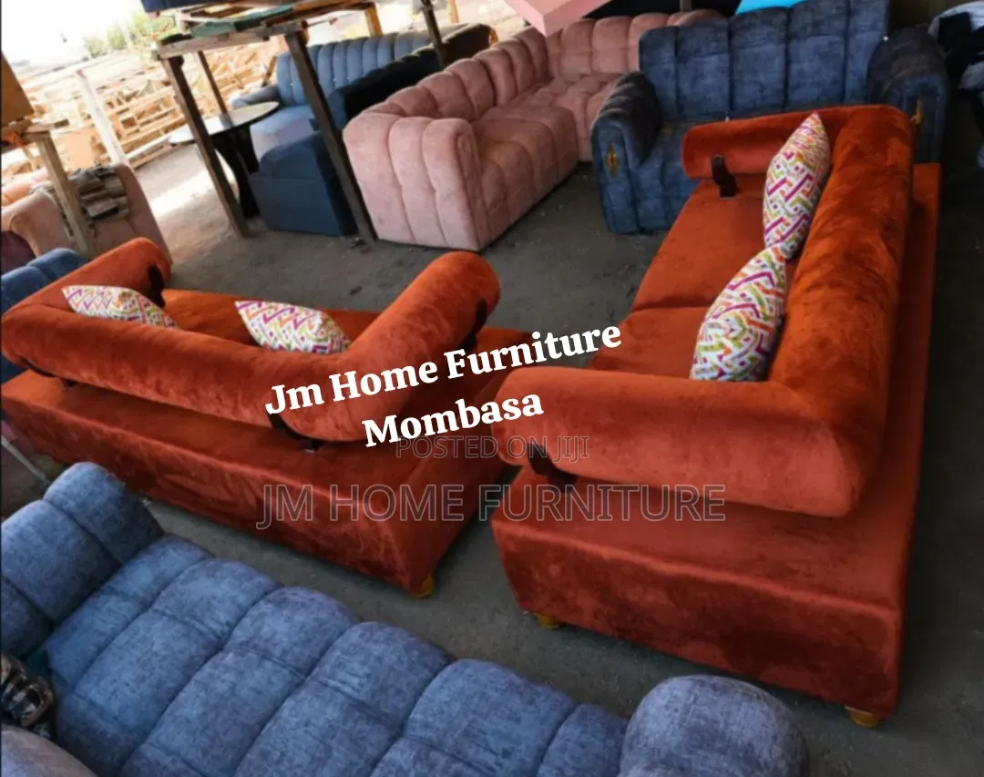 Modern Sofas 6 Seator With Spring Cushions in Orange Colour.