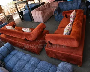 Modern Sofas 6 Seator With Spring Cushions in Orange Colour.
