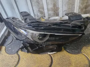 Mazda 3 Headlight RHS Letter 1L