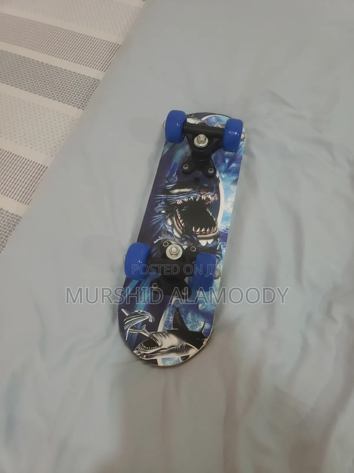 Toy Bundle Including Small Kids Skateboard and Display Nerf Gun