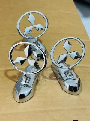 Shiny Silver Mitsubishi Stand Bonnet Mount Badge