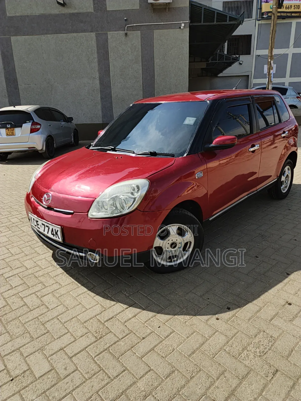 Mazda Verisa 2009 Maroon