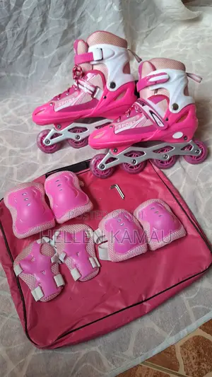 Pink Adjustable Inline Skates Size 39–42 + Protective Gear –Used Thric