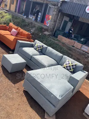 A Sage Green L Shape Couch