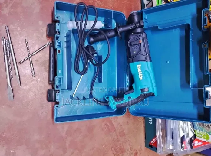Makita HR2470F Heavy-Duty Rotary Hammer Drill in Good Working Cndition