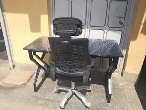 Metallic Table and Strong Mesh Headrest Chair