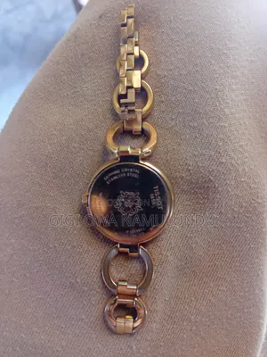 Gold Tossot 1853 Sapphire Crystal