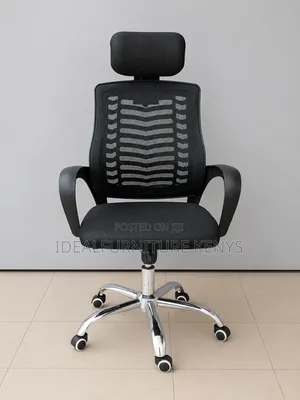 Black Mesh Executive Chair With Headrest & Chrome Base.