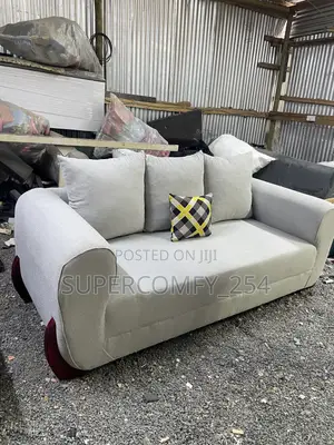 A Three Seater Wooden Stands Boston Seat