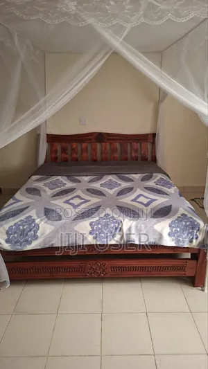 Relatively New 5*6 Bed Plus Mattress