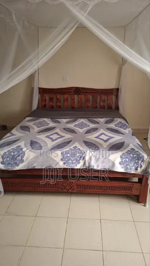 Relatively New 5*6 Bed Plus Mattress