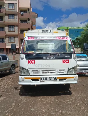 Isuzu NKR 14ft 2001