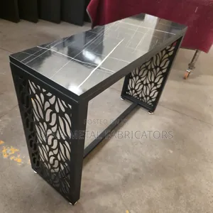 Black Laser-Cut Console Table With Laser-Cut Frame.