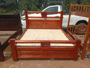 Handcrafted Solid Wood Bed Frame With Carved Panels