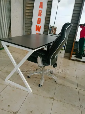Metallic Table and Strong Leather Chair