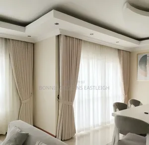 Light Blige Curtains and Off White With Hooks