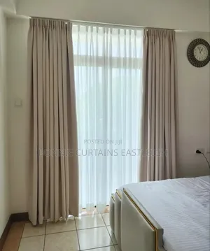 Light Blige Curtains and Off White With Hooks