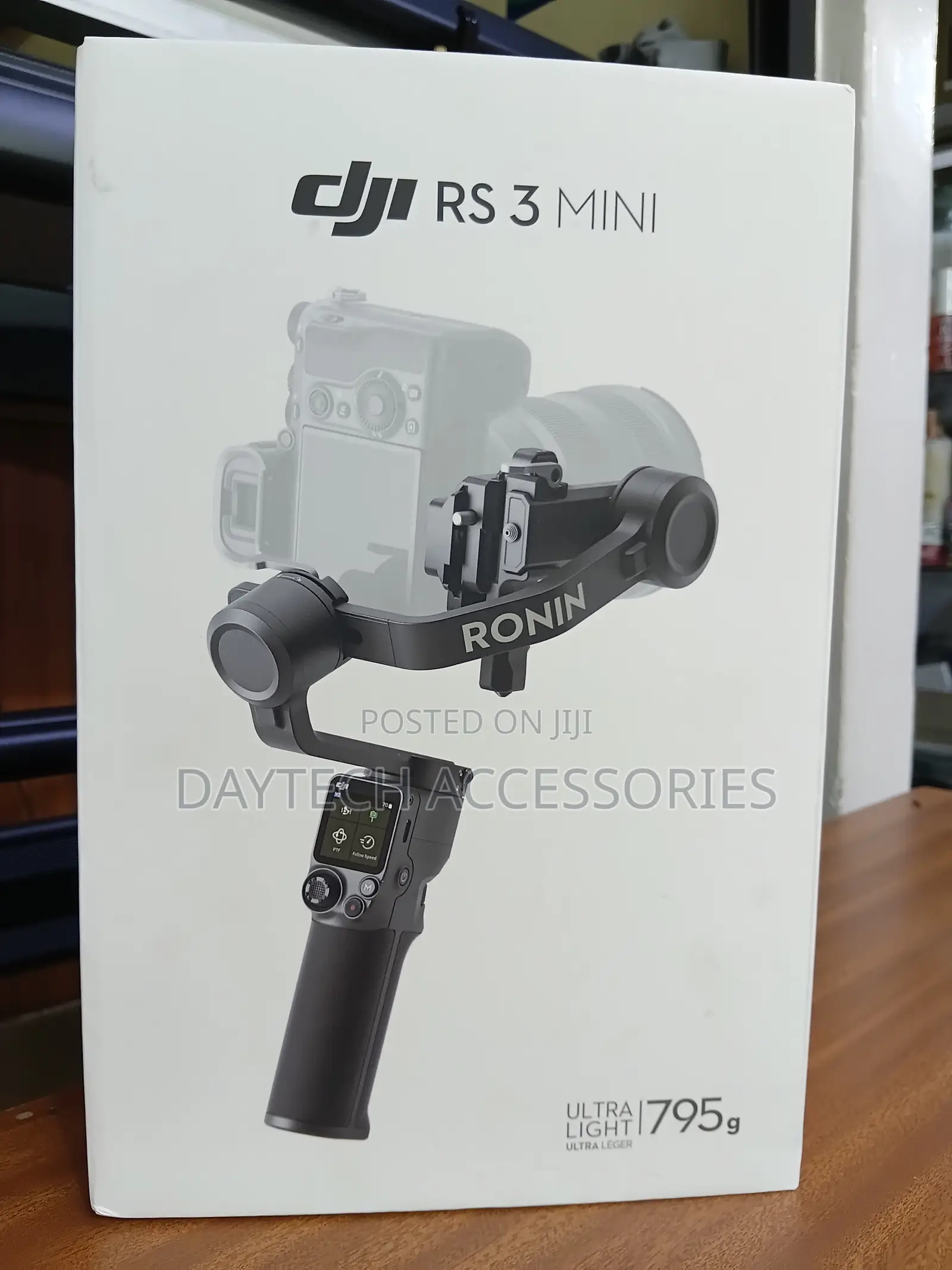 The DJI RS 3 Mini 3-Axis Handheld Gimbal Stabilizer.