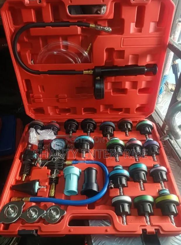 Radiator Pressure Tester and Vacuum-Type Cooling System Refill Kit. - main view