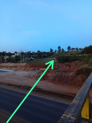 Half-Acre Land for Sale – Prime Highway Location!