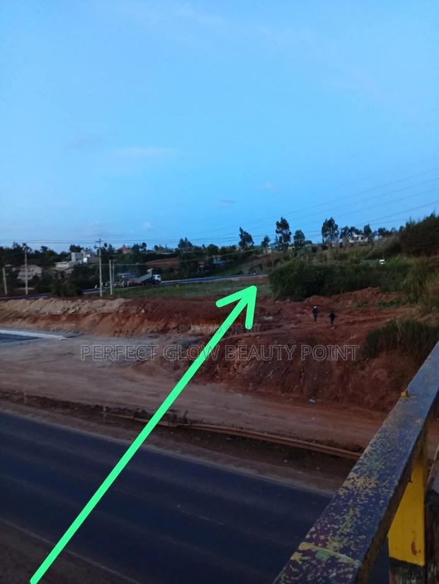 Half-Acre Land for Sale – Prime Highway Location!