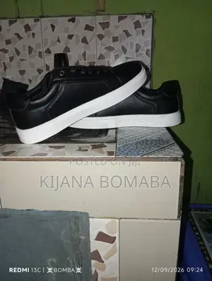 Kiatu Ni Mpya